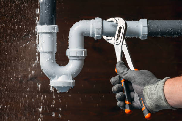 Professional Plumbing technician working in Reading, MA